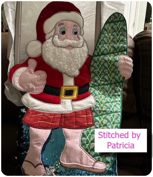 Surfing Santa by Patricia