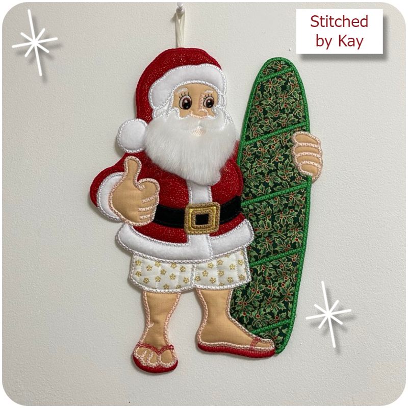 Surfing Santa stitched by Kay